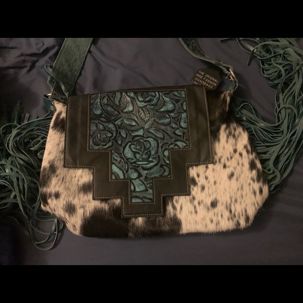 Brand new Holy Cow Couture Travel Designer! Never been carried